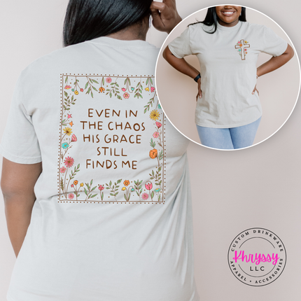Woman wearing a pink Christian floral cross statement tee