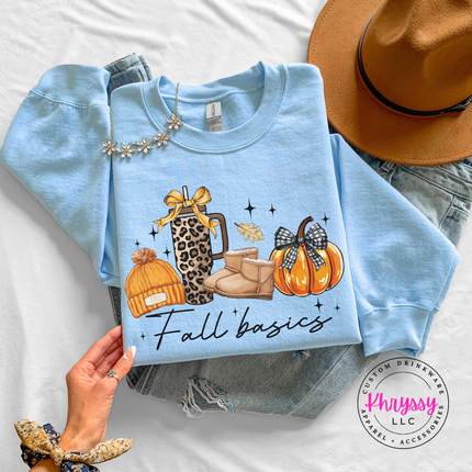 Light Blue crewneck sweatshirt with the cozy fall basics script graphic
