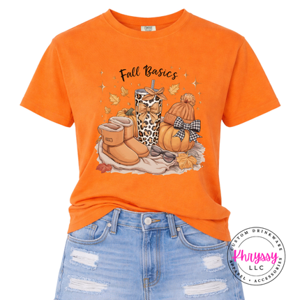 Woman wearing a Burnt Orange tee with a leopard tumbler and boots design.
