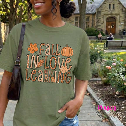 Moss graphic tee featuring a pumpkin and fall teacher lettering.