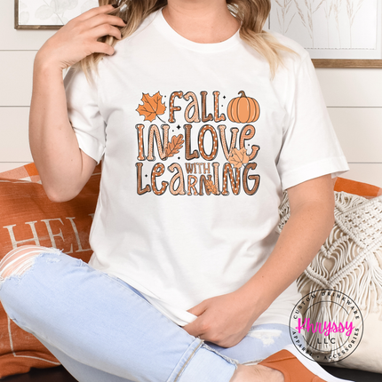White tee with the fall teacher pumpkin and leaves design
