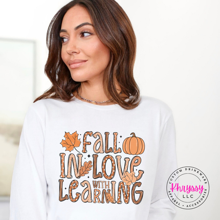 White tee featuring dotted bubble letters and leaves.