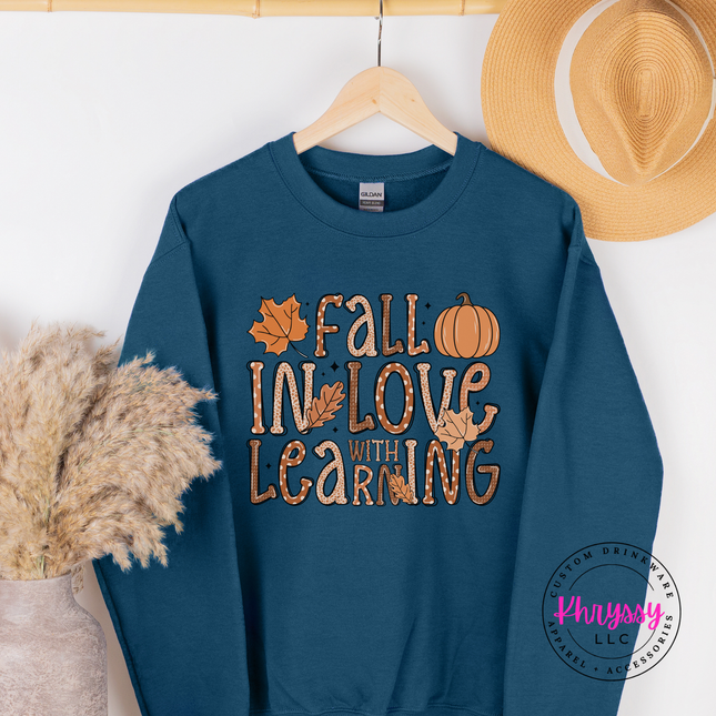 Legion blue crewneck sweatshirt with a playful fall teacher illustration.