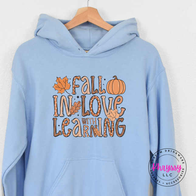 Light Blue pullover hoodie with a hand-illustrated teacher print.