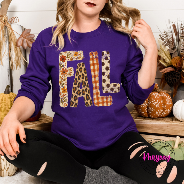 Purple crewneck with FALL leopard and floral lettering.