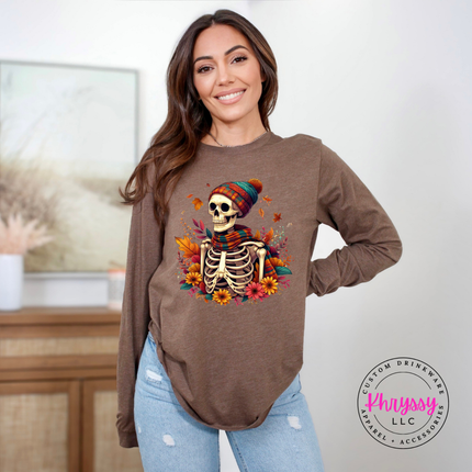 Heather brown tee styled with jeans, featuring a cozy autumn skeleton print.