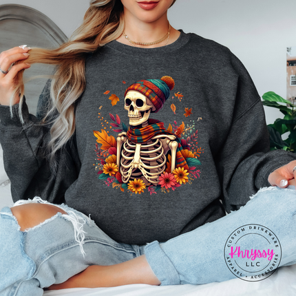 Dark Heather crewneck sweatshirt with the cozy fall skeleton in a beanie graphic
