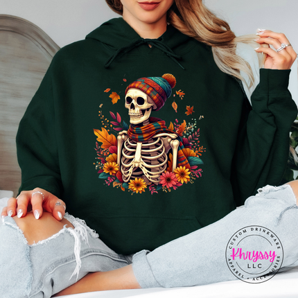 Forest hoodie with the spooky cozy skeleton fall graphic