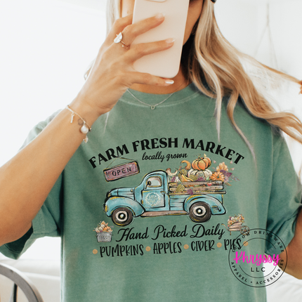 Light green graphic tee with a hand-illustrated Farm Fresh Market print.
