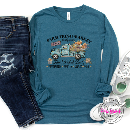 Heather deep teal tee with a farmhouse Farm Fresh Market illustration.