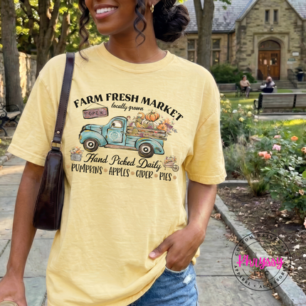 Butter tee with the fall farmers market pumpkin truck design