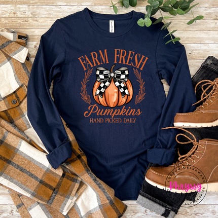 Navy tee featuring a checkered bow pumpkin illustration.