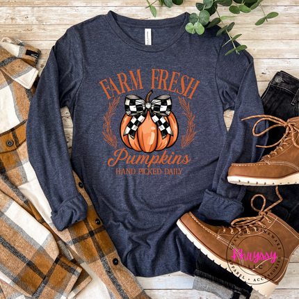 Heather navy tee styled for fall, featuring a checkered bow pumpkin.