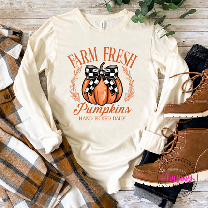 Natural long sleeve tee with the farm fresh pumpkins wreath and bow graphic
