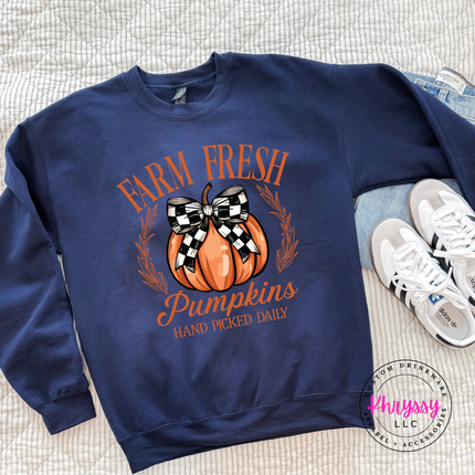 Navy crewneck sweatshirt with a Farm Fresh Pumpkins design.