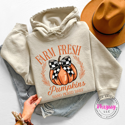 Sand hoodie with the Farm Fresh Pumpkins hand picked daily graphic