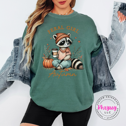 Light Green tee with the feral girl autumn pumpkin raccoon graphic