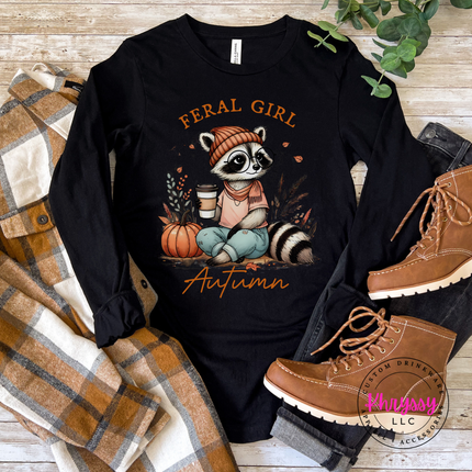 Black tee with a feral girl raccoon design.