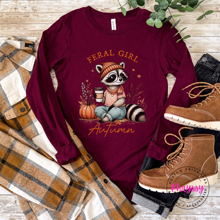Maroon tee styled with jeans, featuring a cozy raccoon design.