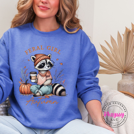 Heather Sport Royal crewneck sweatshirt with the Feral Girl Autumn raccoon graphic
