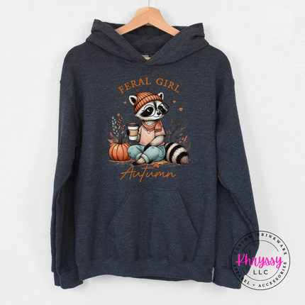 Dark Heather pullover hoodie with a hand-illustrated raccoon and pumpkin print.