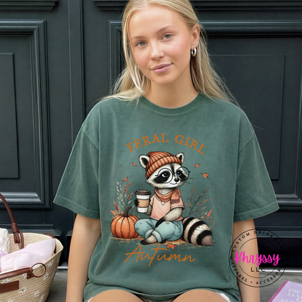 Blue Spruce tee with the raccoon in a beanie fall print