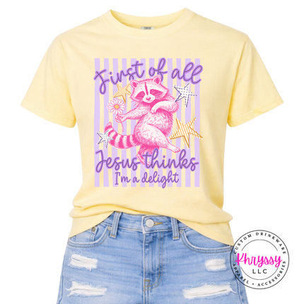 Butter yellow tee with a pink raccoon and Jesus delight design