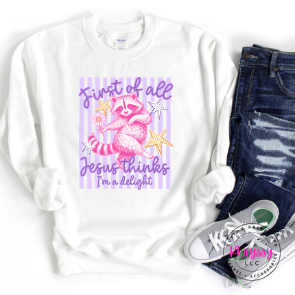 White sweatshirt with a pink raccoon graphic and text, paired with jeans and sneakers on a white background.