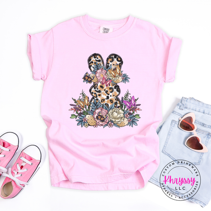 Blossom garment-dyed tee with a leopard floral Easter bunny graphic on the chest.