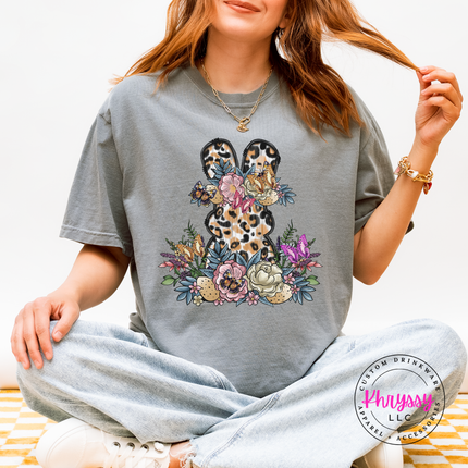Granite garment-dyed tee featuring a leopard bunny with florals and butterflies.