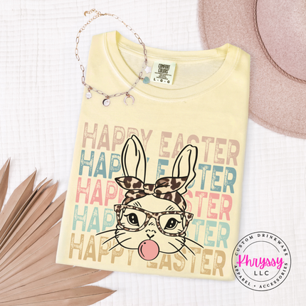 Banana garment-dyed tee with a leopard bunny and stacked Happy Easter lettering.