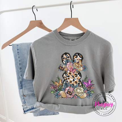Grey garment-dyed tee showing a floral leopard Easter bunny spring design.