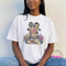 White garment-dyed tee displaying a leopard floral Easter bunny graphic.