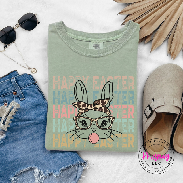 Sage soft cotton tee with a leopard-bandana bunny blowing a pink bubble.