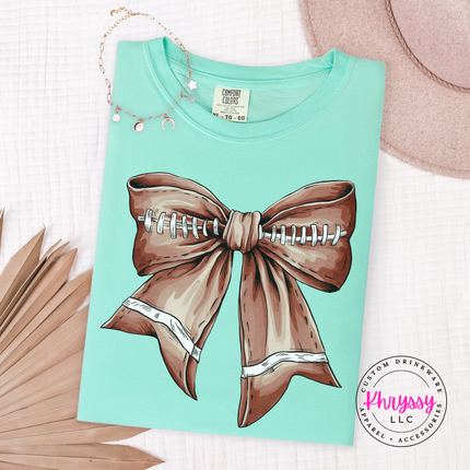 Island Reef tee with the coquette football bow graphic