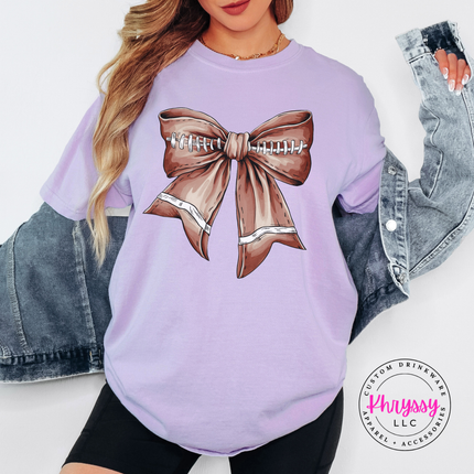 Orchid tee with the football season coquette bow print