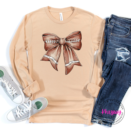 Sand dune long sleeve featuring a game day football bow design.