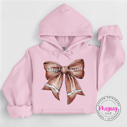 Light Pink hoodie with the coquette football bow graphic
