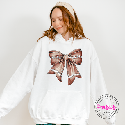 White colored pullover hoodie displaying a football lace bow design.