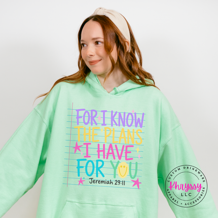 Woman wearing a Mint Green hoodie with the for I know the plans design