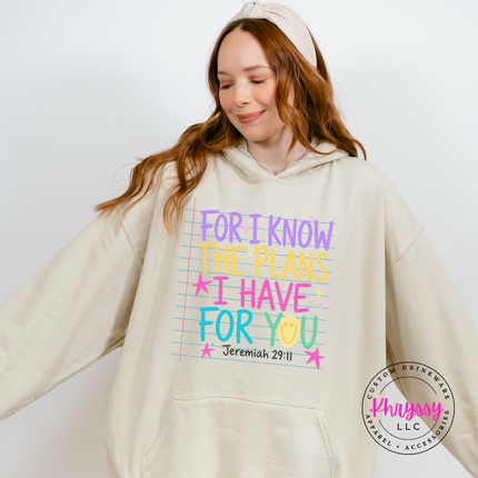 Woman wearing a Sand hoodie with the pastel Jeremiah 29:11 scripture