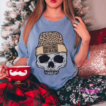 Woman wearing the Freezing To Death skull tee in Blue Jean.