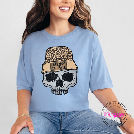 Washed Denim tee featuring a skull wearing a leopard knit beanie.