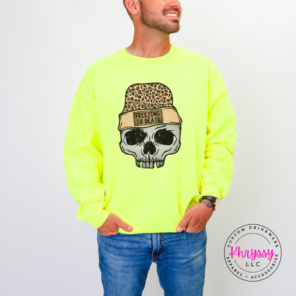 Man wearing the Freezing To Death skull crewneck sweatshirt in Safety Green.