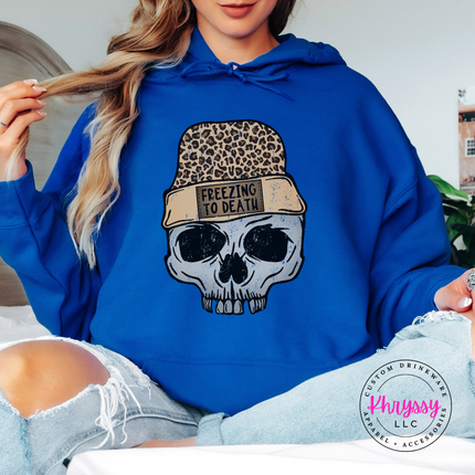 Royal hoodie featuring a skull wearing a leopard knit beanie.