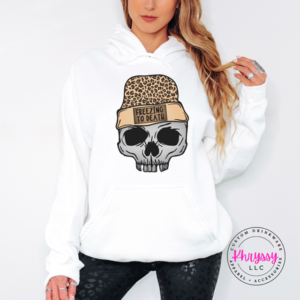 Close up of the Freezing To Death beanie patch on a White hoodie.