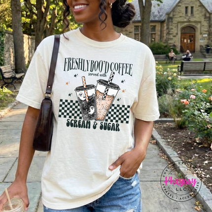White pigment-dyed tee with a fun Scream and Sugar Halloween coffee design.