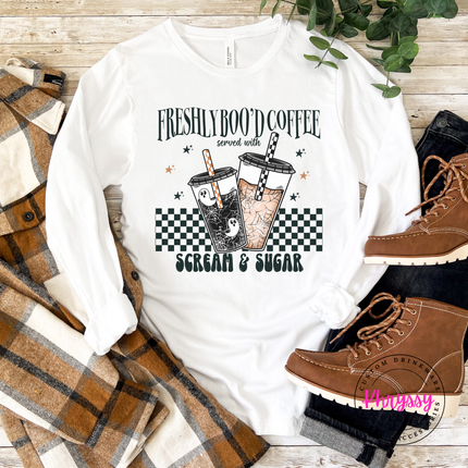 White lightweight cotton long sleeve styled for fall with a coffee print.