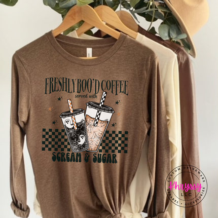 Heather brown long sleeve showing a playful Freshly Boo'd Coffee graphic.