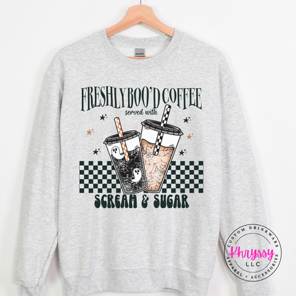 Ash crewneck sweatshirt with a Halloween coffee cup graphic.